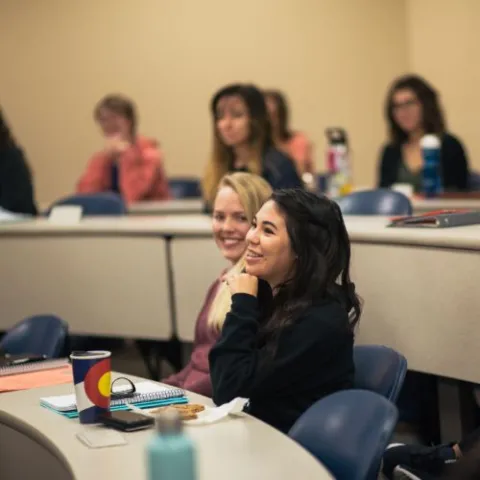 student sitting in classroom